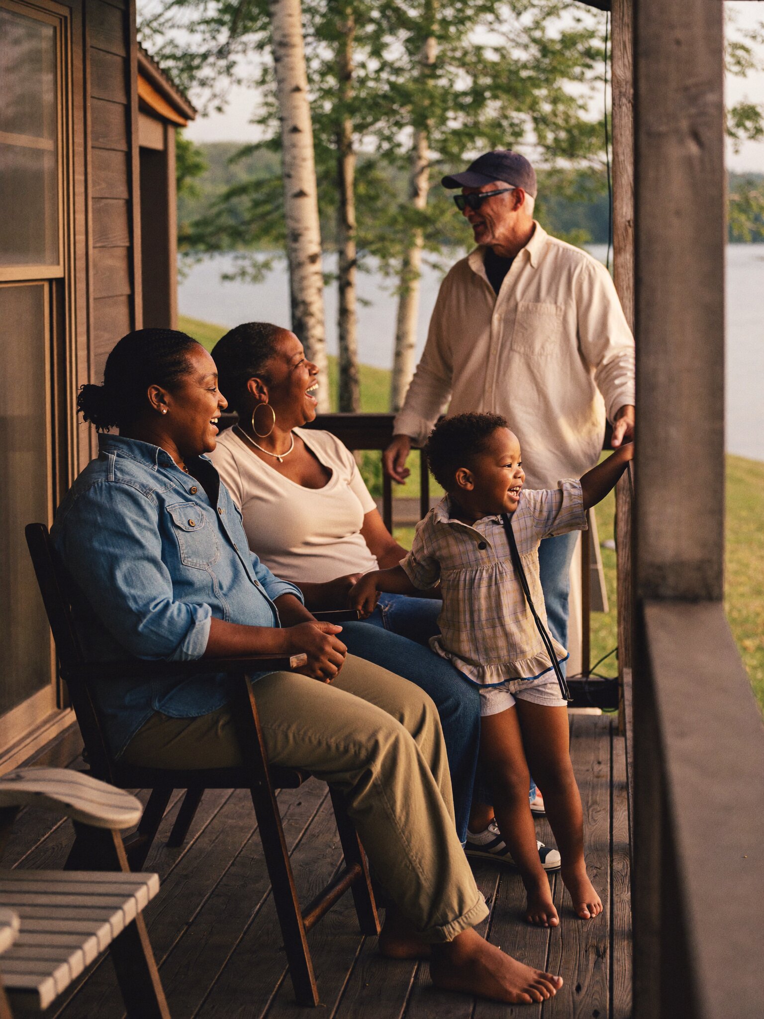 A young family on the front porch of their Minneapolis home